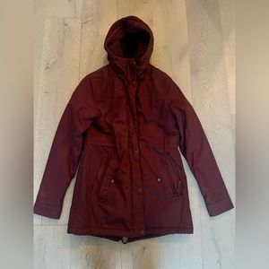 Size medium NWOT Woods winter coat. Water repellant, fuzzy interior.